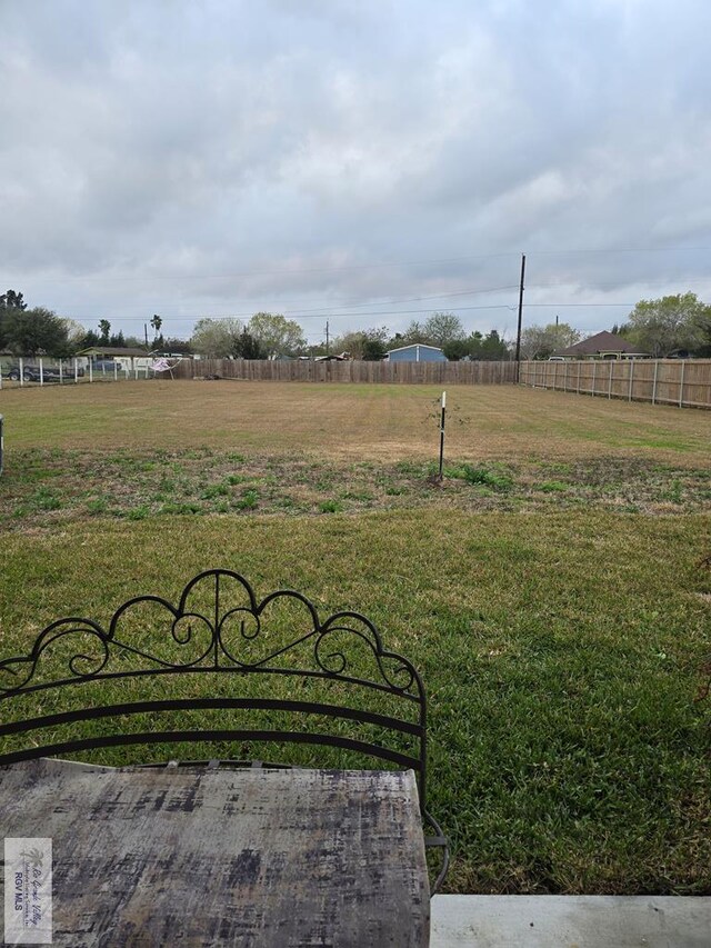 back of property featuring a patio and a yard