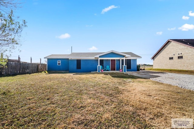 ranch-style home with a front yard