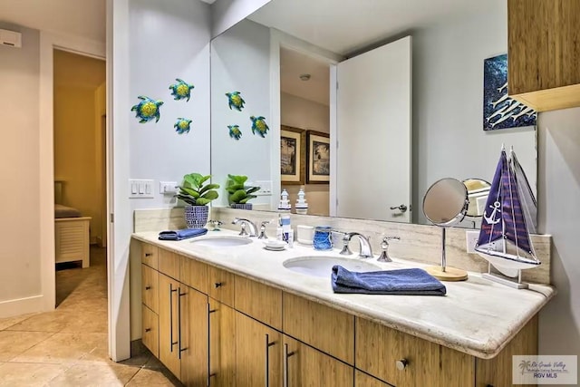 310 Padre Blvd Unit 1402, South Padre Island, TX 78597 - full bath with double vanity and tile patterned floors