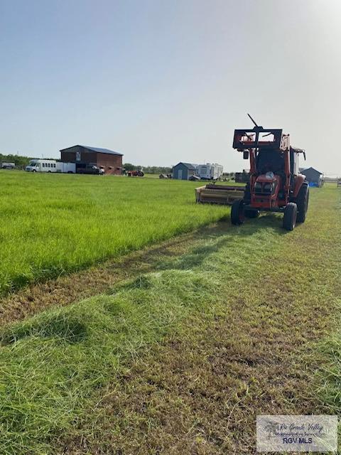 view of yard with a rural view