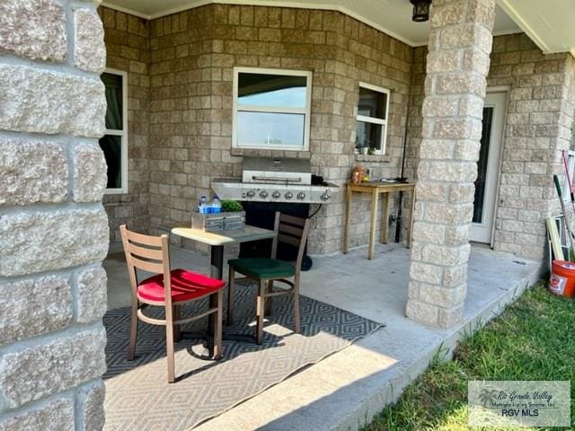 view of patio featuring area for grilling and grilling area