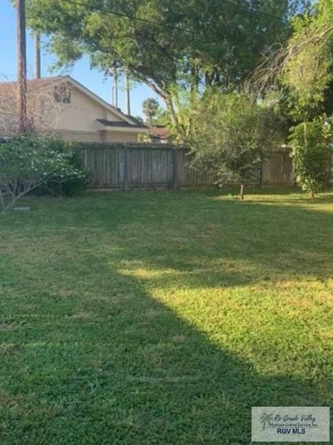 view of yard with fence