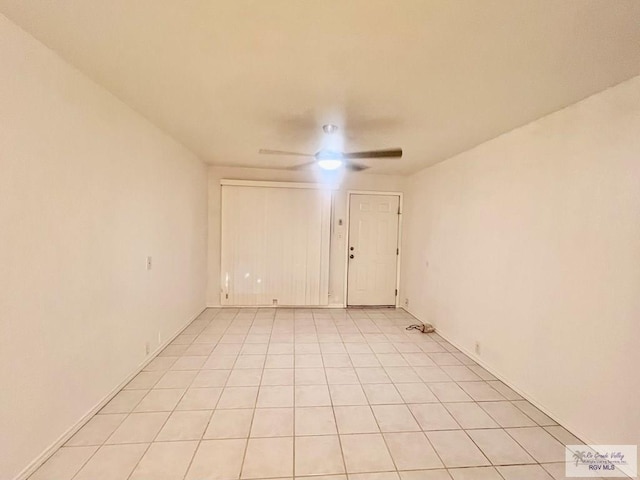 empty room featuring light tile patterned floors