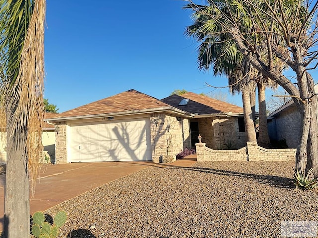 ranch-style house featuring a garage