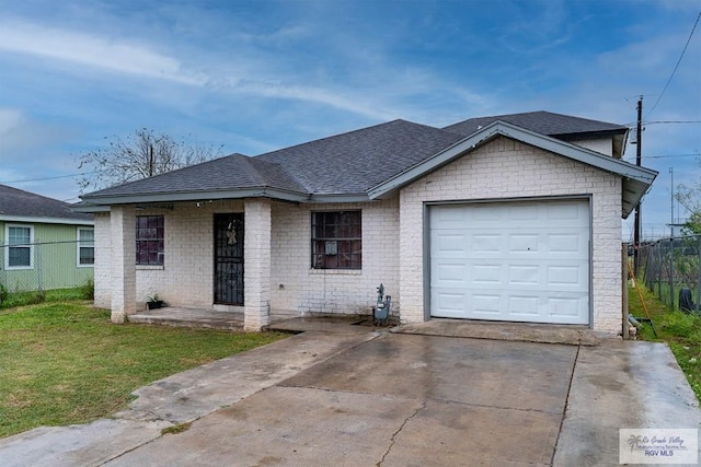 single story home featuring a front yard and a garage