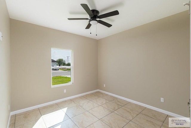 empty room featuring ceiling fan