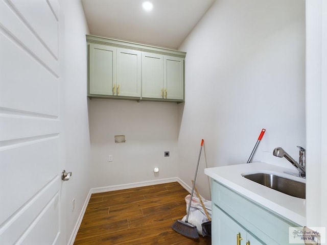 laundry room with sink, cabinets, dark hardwood / wood-style floors, and hookup for an electric dryer