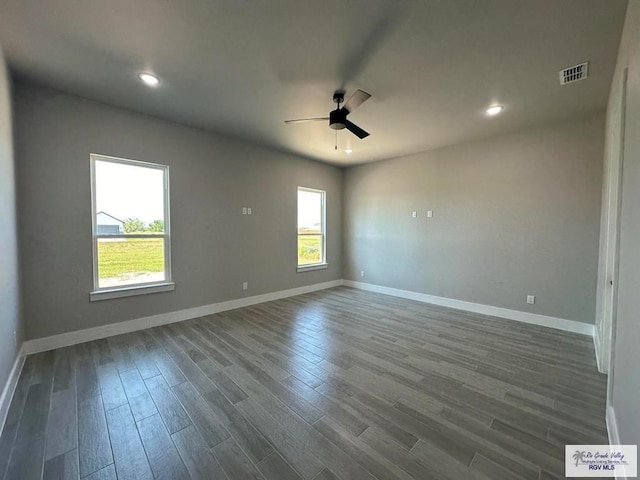 spare room with ceiling fan and hardwood / wood-style floors