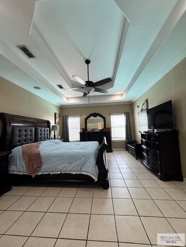 6020 Rusty Nail Dr, Brownsville, TX 78526 - bedroom featuring a raised ceiling, light tile patterned floors, ornamental molding, and ceiling fan
