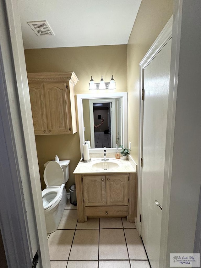 6020 Rusty Nail Dr, Brownsville, TX 78526 - bathroom with vanity and tile patterned floors
