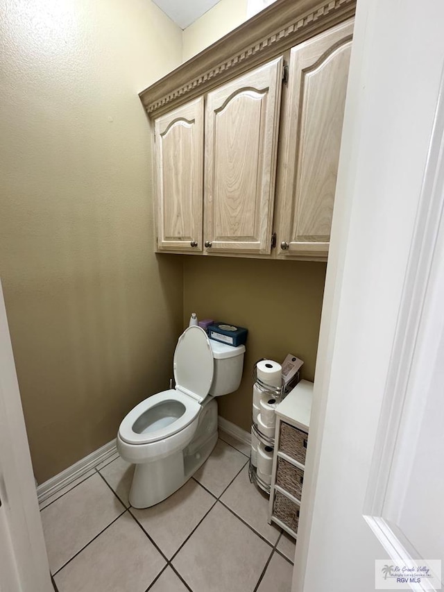 6020 Rusty Nail Dr, Brownsville, TX 78526 - bathroom with toilet and tile patterned flooring