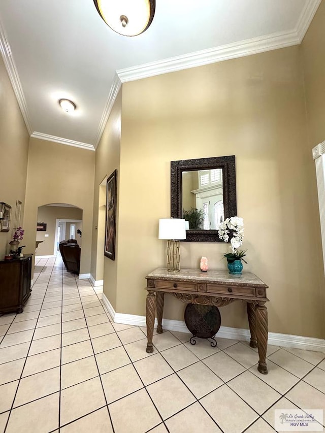 6020 Rusty Nail Dr, Brownsville, TX 78526 - corridor featuring arched walkways, light tile patterned floors, and crown molding