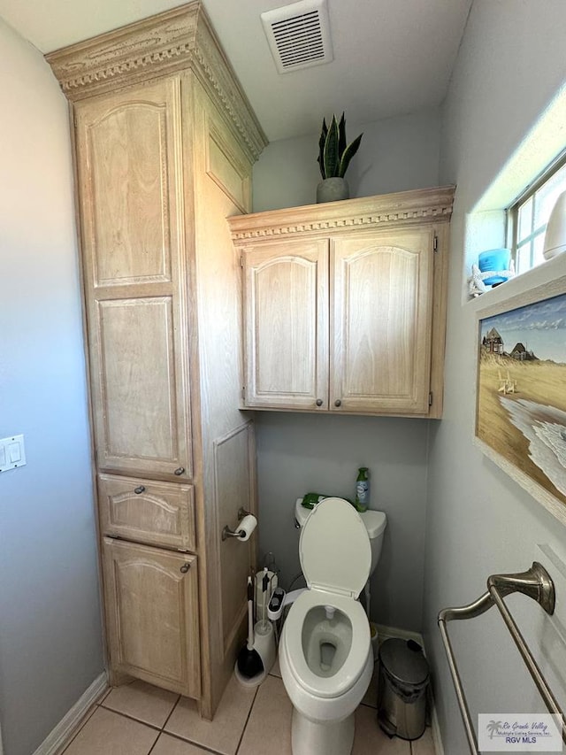 6020 Rusty Nail Dr, Brownsville, TX 78526 - bathroom with toilet and tile patterned flooring