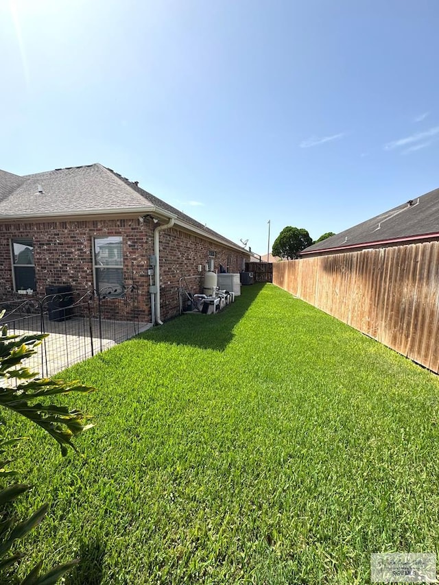6020 Rusty Nail Dr, Brownsville, TX 78526 - view of yard with a patio area