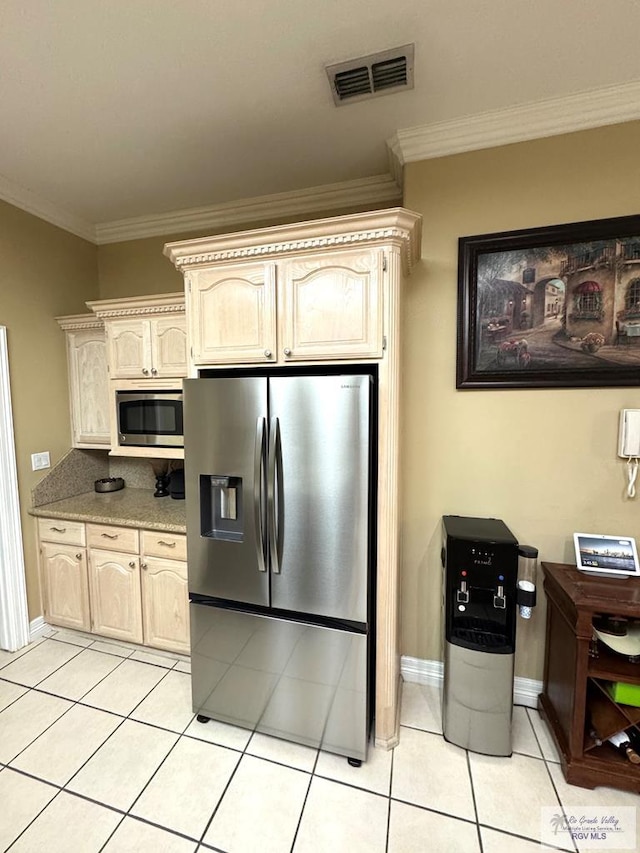 6020 Rusty Nail Dr, Brownsville, TX 78526 - kitchen featuring stainless steel appliances, light tile patterned floors, crown molding, and light brown cabinets