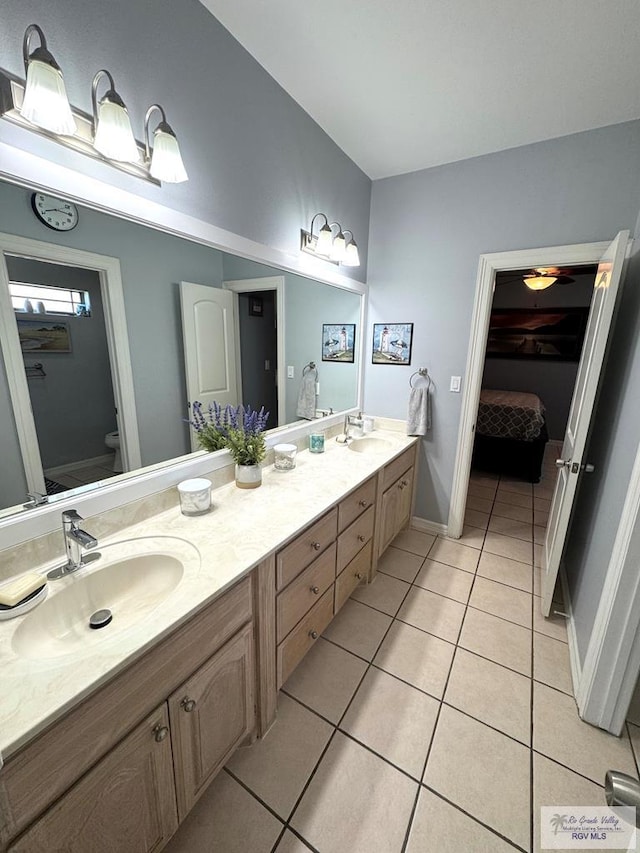 6020 Rusty Nail Dr, Brownsville, TX 78526 - ensuite bathroom featuring tile patterned floors and double vanity