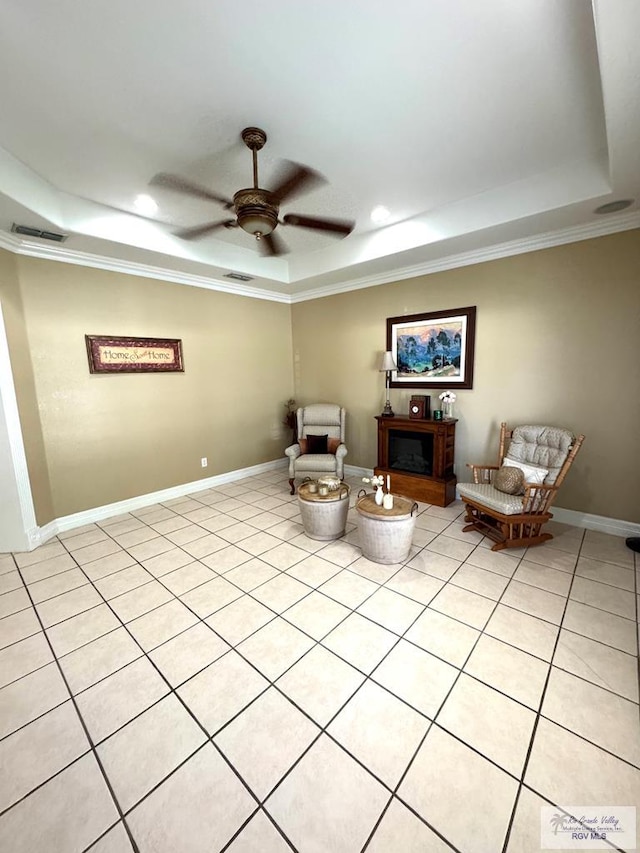 6020 Rusty Nail Dr, Brownsville, TX 78526 - living area featuring a raised ceiling, ornamental molding, a ceiling fan, recessed lighting, and light tile patterned floors