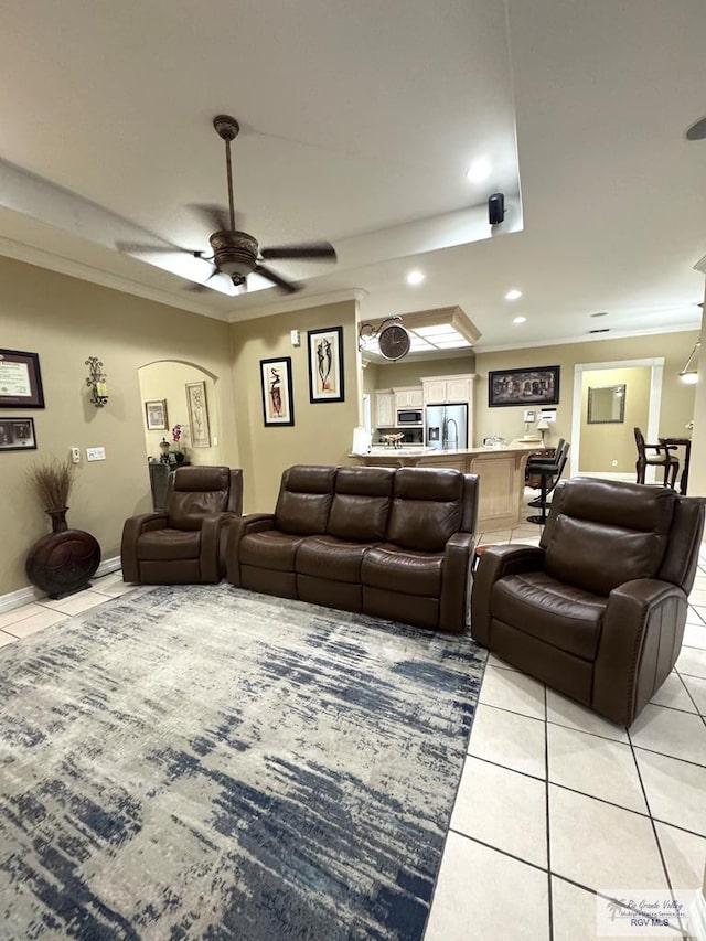 6020 Rusty Nail Dr, Brownsville, TX 78526 - living area featuring light tile patterned flooring, crown molding, ceiling fan, and recessed lighting