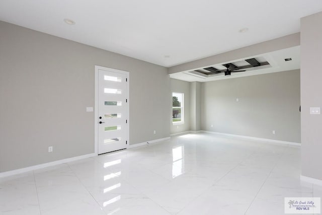 entrance foyer featuring ceiling fan