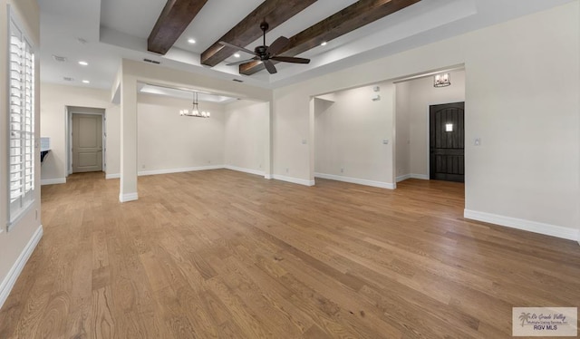 8005 King Sago Ct, Harlingen, TX 78552 - unfurnished living room featuring ceiling fan, beamed ceiling, a chandelier, light wood-style flooring, and recessed lighting