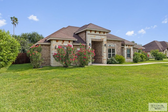 8005 King Sago Ct, Harlingen, TX 78552 - view of front of home featuring stone siding and brick siding