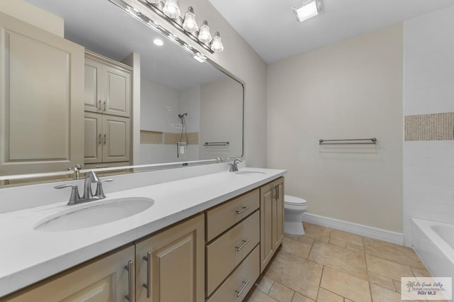 8005 King Sago Ct, Harlingen, TX 78552 - bathroom featuring double vanity and bathing tub / shower combination