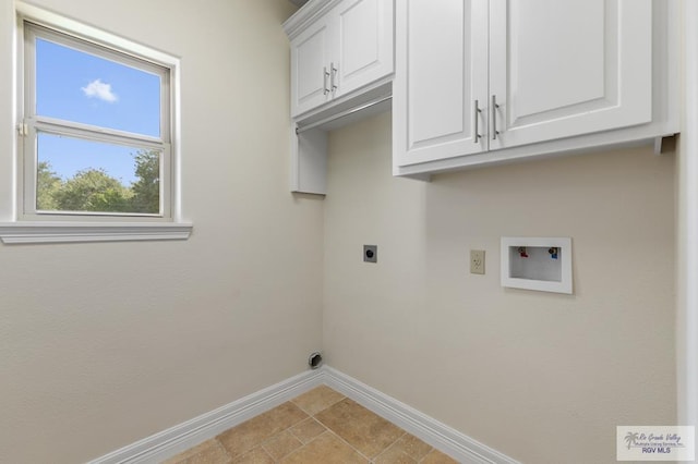 8005 King Sago Ct, Harlingen, TX 78552 - washroom with cabinet space, hookup for an electric dryer, and hookup for a washing machine