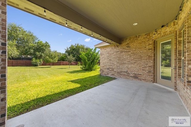 8005 King Sago Ct, Harlingen, TX 78552 - fenced backyard featuring a patio
