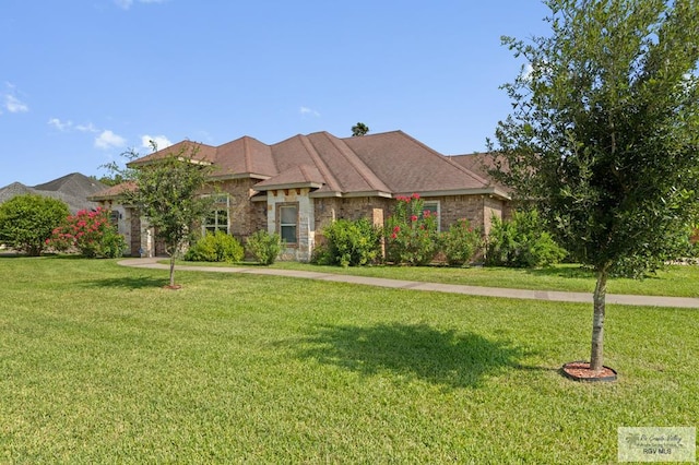 8005 King Sago Ct, Harlingen, TX 78552 - view of front of property with a front yard