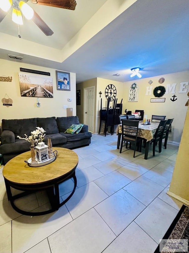 2 Woodstone Dr, Brownsville, TX 78526 - living room featuring light tile patterned floors, ceiling fan, visible vents, and baseboards