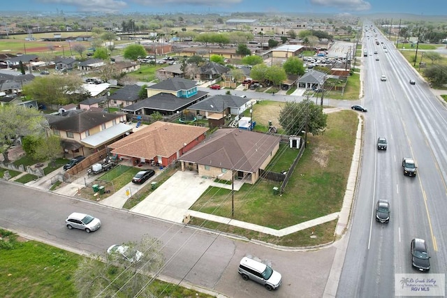 drone / aerial view with a residential view