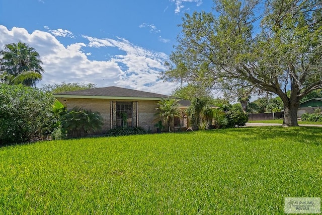 view of front of property with a front lawn