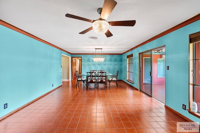 unfurnished dining area featuring ceiling fan and ornamental molding