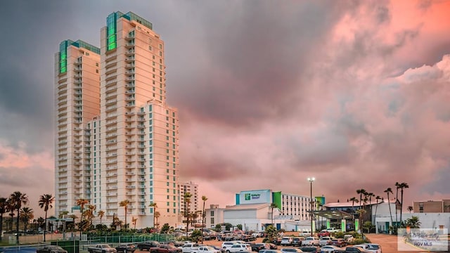 view of outdoor building at dusk