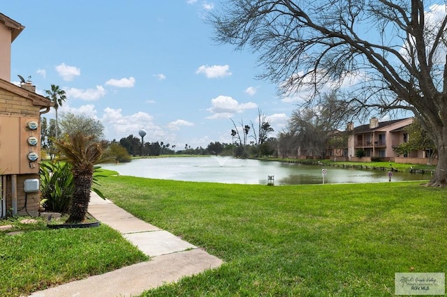 view of yard with a water view