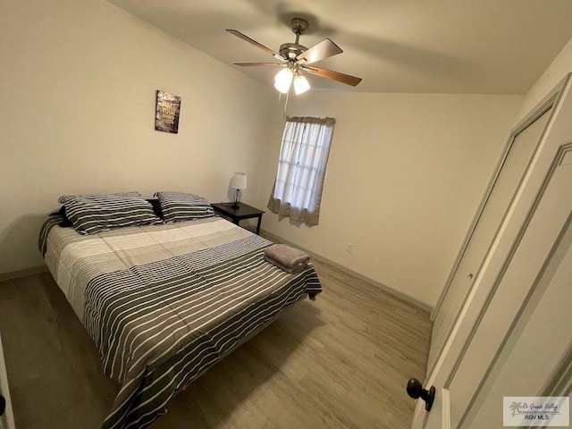 bedroom featuring ceiling fan and light hardwood / wood-style floors