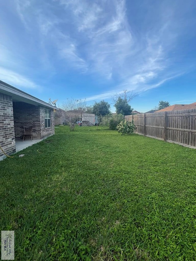 view of yard with a patio area