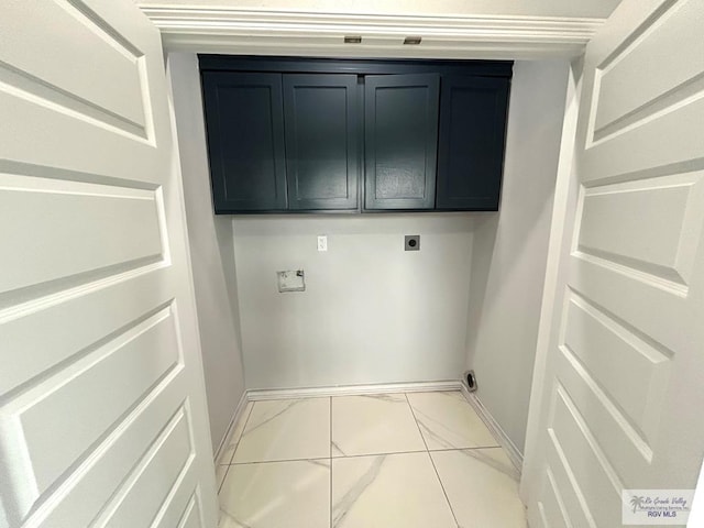 laundry area with electric dryer hookup, washer hookup, and cabinets