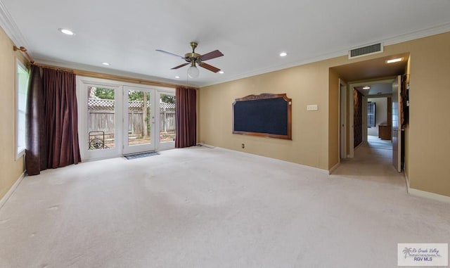 509 Lake Dr, Harlingen, TX 78550 - unfurnished room featuring crown molding, carpet, a ceiling fan, and recessed lighting