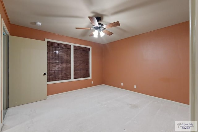 509 Lake Dr, Harlingen, TX 78550 - carpeted spare room featuring ceiling fan and a smoke detector