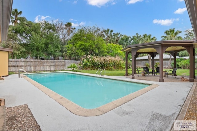 509 Lake Dr, Harlingen, TX 78550 - view of swimming pool featuring a gazebo, a patio, and a fenced backyard