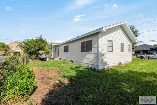 exterior space featuring a lawn