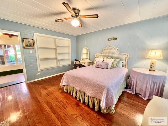 1914 S Parkwood Dr, Harlingen, TX 78550 - bedroom featuring wood finished floors and ceiling fan