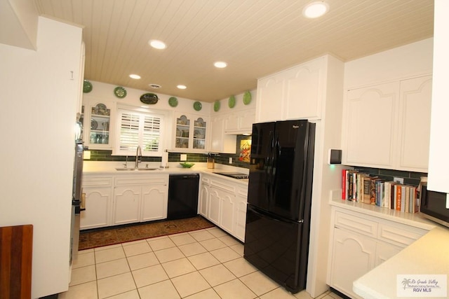 1914 S Parkwood Dr, Harlingen, TX 78550 - kitchen with black appliances, recessed lighting, white cabinets, decorative backsplash, and wood ceiling