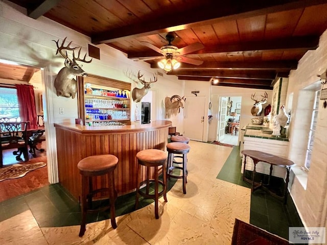 1914 S Parkwood Dr, Harlingen, TX 78550 - indoor dry bar with a wood ceiling with exposed beams and ceiling fan