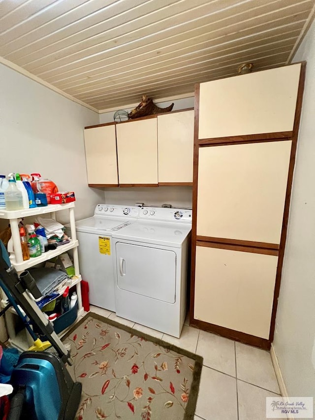 1914 S Parkwood Dr, Harlingen, TX 78550 - washroom with cabinet space, independent washer and dryer, light tile patterned flooring, and crown molding