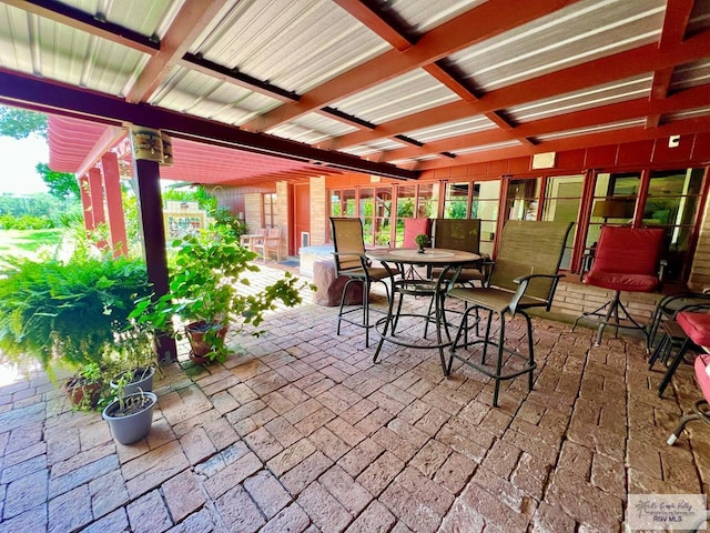 1914 S Parkwood Dr, Harlingen, TX 78550 - view of patio / terrace with outdoor dining space