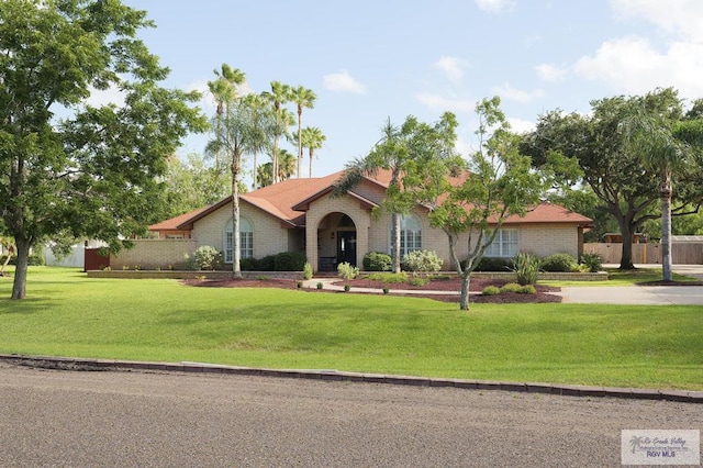 view of front of home with a front lawn