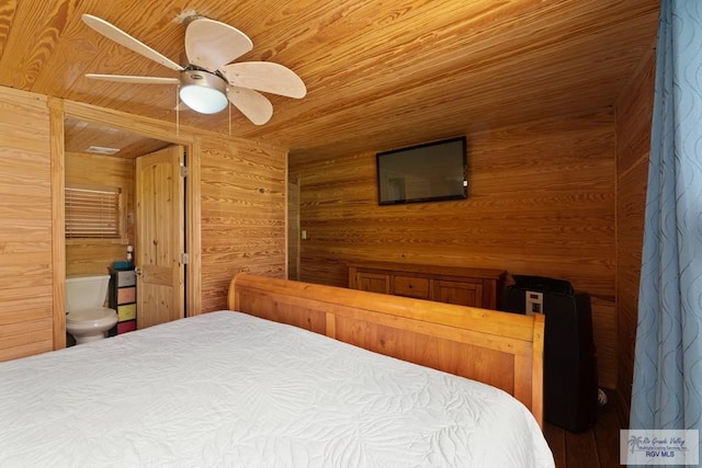 bedroom with ensuite bath, ceiling fan, wooden ceiling, and wood walls