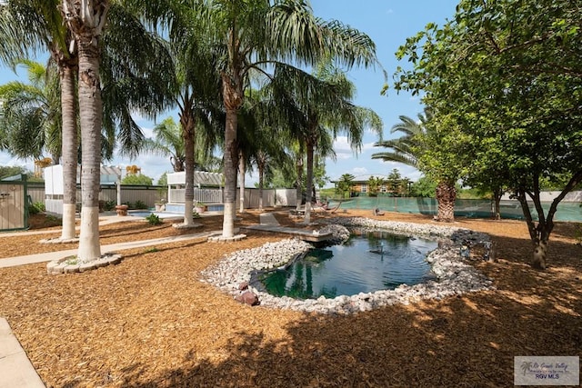 view of property's community featuring a pool